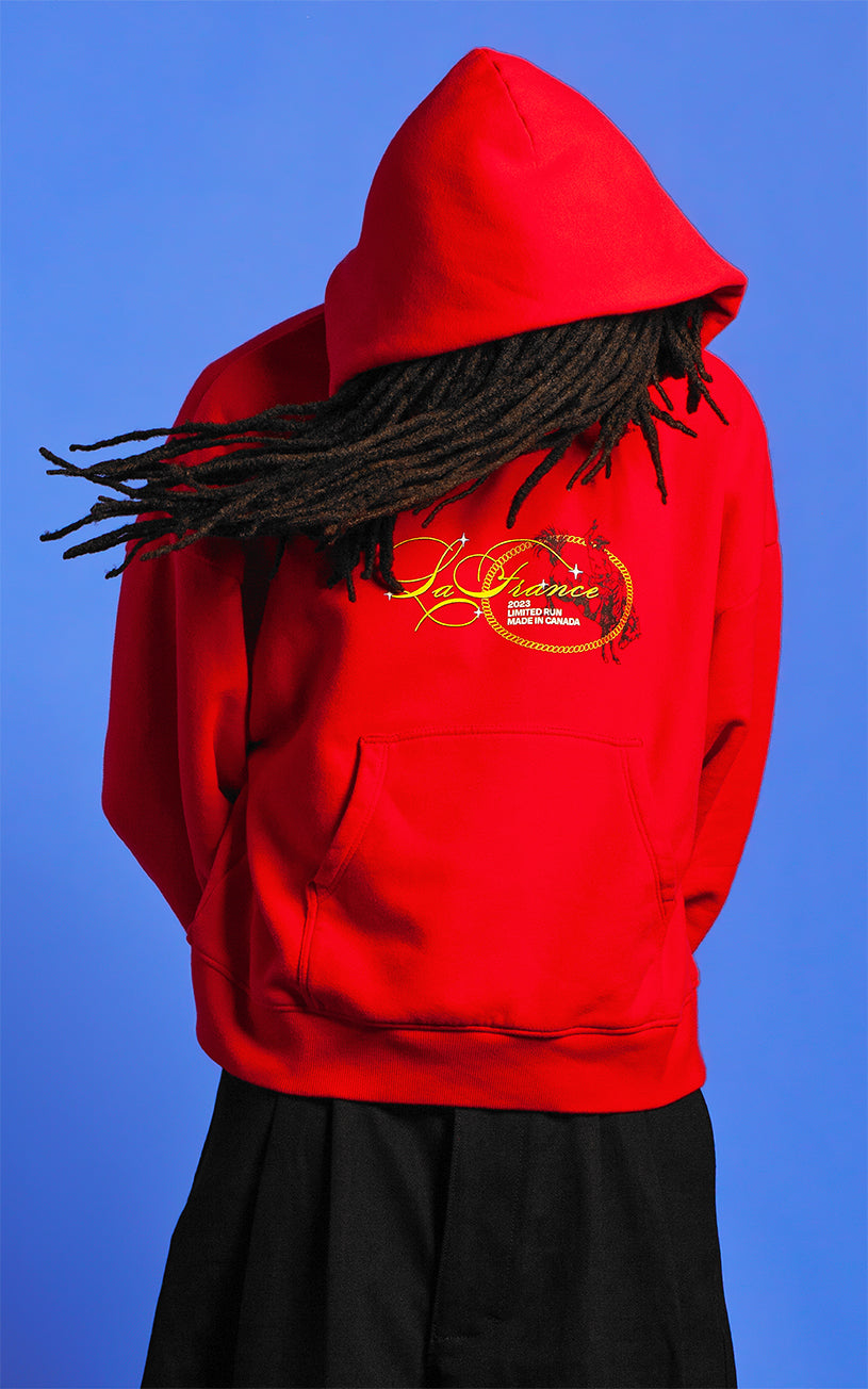 LaFrance Cropped Red Stampede Hoodie & Black Pleated Denim